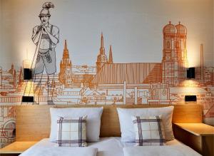 a bedroom with a wall mural of a city at McDreams Hotel München - Messe in Feldkirchen