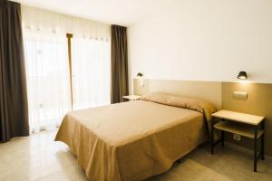 Postel nebo postele na pokoji v ubytování San Diego Apartments By Mc + 12 fotografií