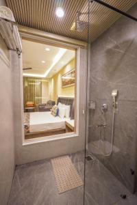 Vannituba majutusasutuses Carom Hotel Manali