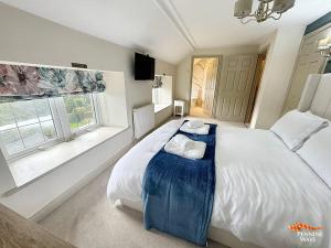 Postel nebo postele na pokoji v ubytování Headmasters House