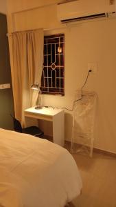 Ένα ή περισσότερα κρεβάτια σε δωμάτιο στο Wonderland Mandrem