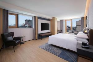 Televiisor ja/või meelelahutuskeskus majutusasutuses Four Points by Sheraton Xi'an Dayan Pagoda