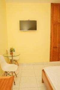 Телевизор и/или развлекательный центр в Thuy Trang hotel 1