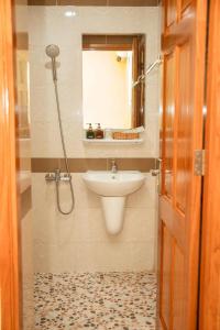 Ванная комната в Thuy Trang hotel 1 +10 фотографий