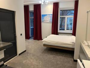 Ένα ή περισσότερα κρεβάτια σε δωμάτιο στο Отель Преображенский