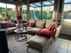 Гостиная зона в Moderner gepflegter Nr 142 ruhiger Bungalow, Strandnah mit großen, uneinsehbaren Garten, Terrassenüberdachung