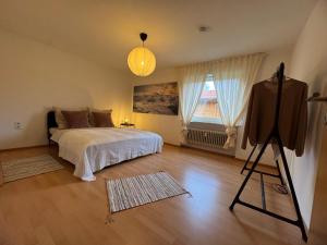 Postel nebo postele na pokoji v ubytování Ferienwohnung Do Blym