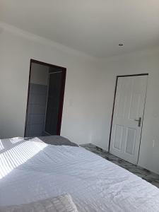 Postel nebo postele na pokoji v ubytování The Thaelo Villa + 3 fotografie