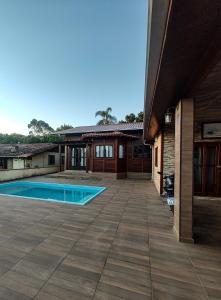 Swimmingpoolen hos eller tæt på Casa com Piscina em Balneário Piçarras