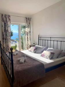 Postel nebo postele na pokoji v ubytování New! Apartment Complex "S"