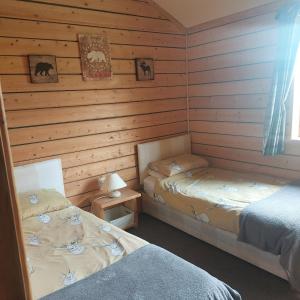 Voodi või voodid majutusasutuse Deer Cabin-hot tub-dog friendly-mountain view toas
