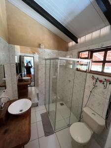 Et badeværelse på Quintal dos buritis