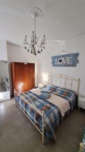 Ένα ή περισσότερα κρεβάτια σε δωμάτιο στο Tana della Lavanda +120 φωτογραφίες