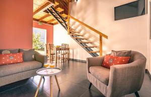 Χώρος καθιστικού στο Kaz Goyavier - Bungalow avec Piscine a L Entre Deux