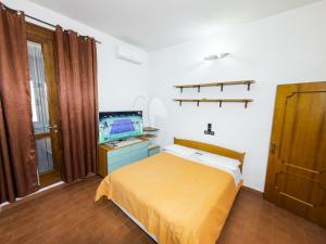 Ένα ή περισσότερα κρεβάτια σε δωμάτιο στο B&B Barone