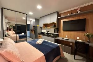 Μια τηλεόραση ή/και κέντρο ψυχαγωγίας στο Studio Ágape- Equilíbrio e localização.