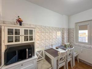 TV a/nebo společenská místnost v ubytování DurAsset Home 2