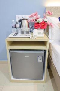 Una cocina o cocineta en AQ Hotel 17 fotos más