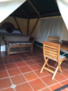 Postel nebo postele na pokoji v ubytování Glamping El Establo