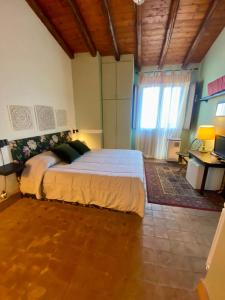 a bedroom with a large bed in a room at Casa dei sogni in Taormina