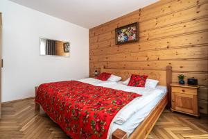 Ένα ή περισσότερα κρεβάτια σε δωμάτιο στο Apartament Floryda APARTZAKOP