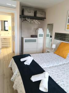 Ένα ή περισσότερα κρεβάτια σε δωμάτιο στο Panoramic view Puerto Rico +25 φωτογραφίες