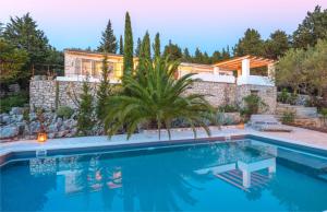 Swimmingpoolen hos eller tæt på Villa Pelagia