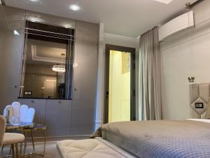 Giường trong phòng chung tại Premiere Monte Carlo +4 ảnh