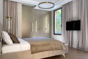 Giường trong phòng chung tại Premiere Monte Carlo