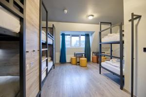 a dorm room with bunk beds in it at a&o Rotterdam City in Rotterdam