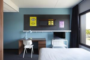 Postel nebo postele na pokoji v ubytování The Social Hub Groningen Extended Stay