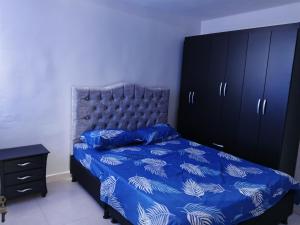 Postel nebo postele na pokoji v ubytování Acogedor apartamento en ibague 403 + 12 fotografií