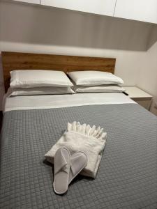 Postel nebo postele na pokoji v ubytování Anxur Apartment