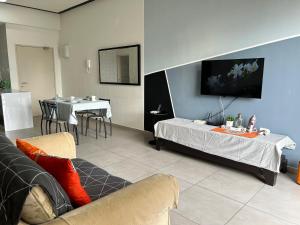 Televiisor ja/või meelelahutuskeskus majutusasutuses TopRoof Infinity Pool 2-6pax 5minJonker