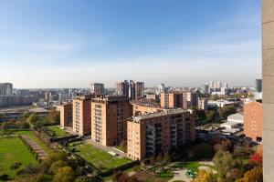 an aerial view of a city with tall buildings at Settimo Cielo - San Cristoforo in Milan