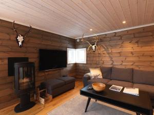Et tv og/eller underholdning på Stranda Fjellgrend 3 bedrooms - 32A