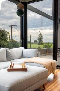 Ένα ή περισσότερα κρεβάτια σε δωμάτιο στο Luxury Bayside Townhouse Near Beach St Kilda