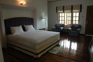Katil atau katil-katil dalam bilik di Myanmar Life Hotel