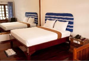 Katil atau katil-katil dalam bilik di Myanmar Life Hotel