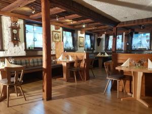 Restaurace v ubytování Holzwurm Apartments