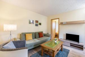 Posezení v ubytování Ferienhaus in Wald- und Seenähe