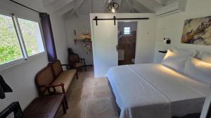 Ένα ή περισσότερα κρεβάτια σε δωμάτιο στο Cozy house with private pool in Petite Saline