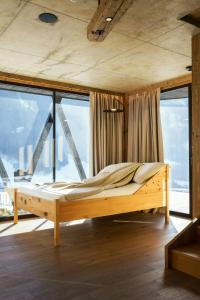 Ένα ή περισσότερα κρεβάτια σε δωμάτιο στο Chalet With Sauna And Hot Tub In Anterselva Valley