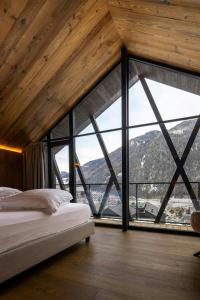 Ένα ή περισσότερα κρεβάτια σε δωμάτιο στο Chalet With Sauna And Hot Tub In Anterselva Valley