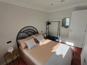 En eller flere senge i et værelse på Apartamento céntrico en Vigo