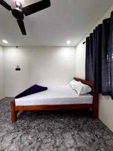 En eller flere senge i et værelse på Kanthalloor Zen Zoner