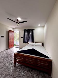 En eller flere senge i et værelse på Kanthalloor Zen Zoner