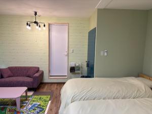 Ένα ή περισσότερα κρεβάτια σε δωμάτιο στο Cate no mori - Vacation STAY 52818v