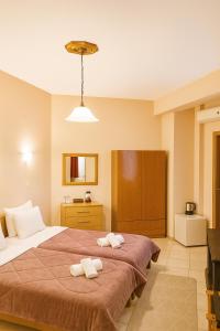 Postel nebo postele na pokoji v ubytování Hotel Siatistino Archontariki + 7 fotografií