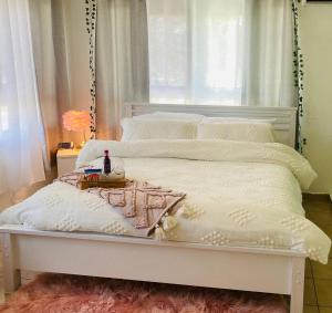 En eller flere senge i et værelse på Tropical Studio Boutique - Cerca de Gozalandia